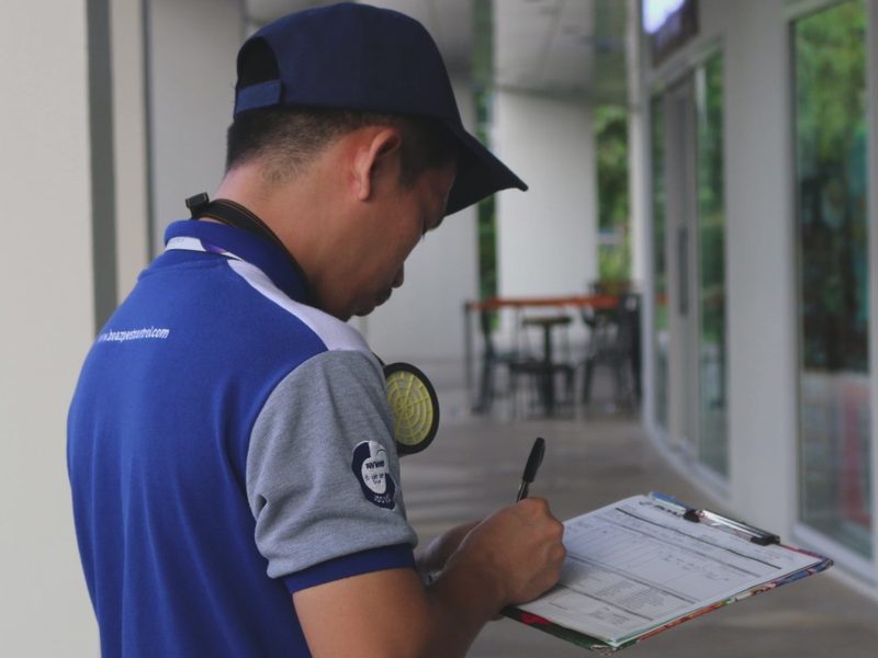 BOAZ technician documenting an on-site inspection